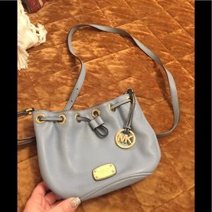 Baby blue Michael Kors bucket bag.